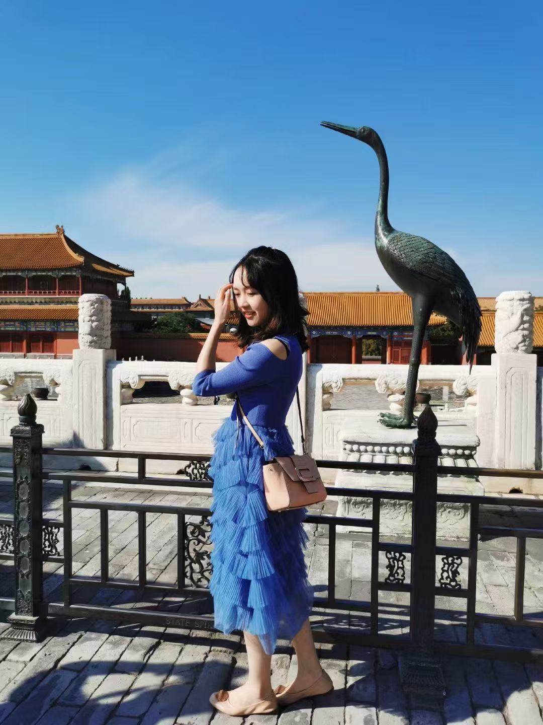 International traveler at the Forbidden City during a first China journey