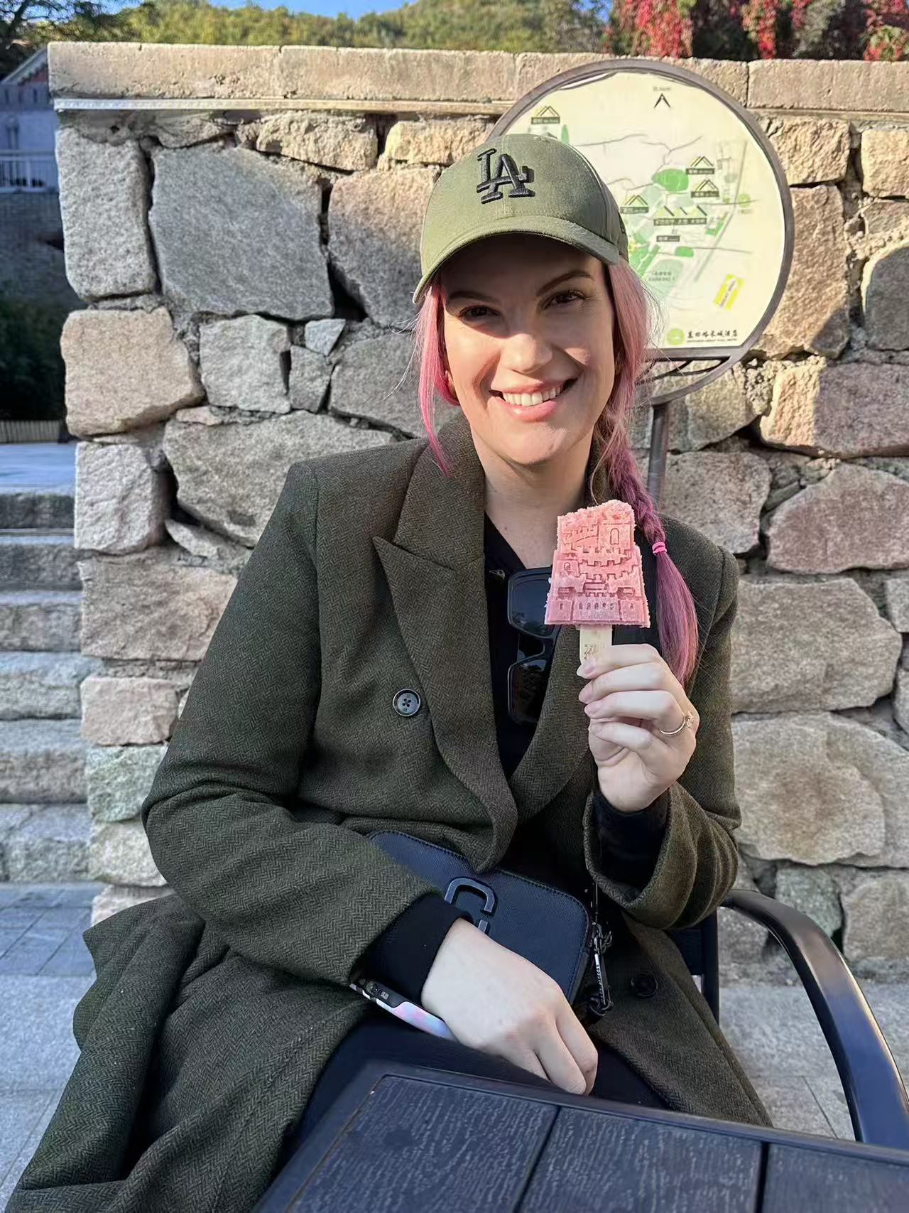 Guest trying a local snack in China