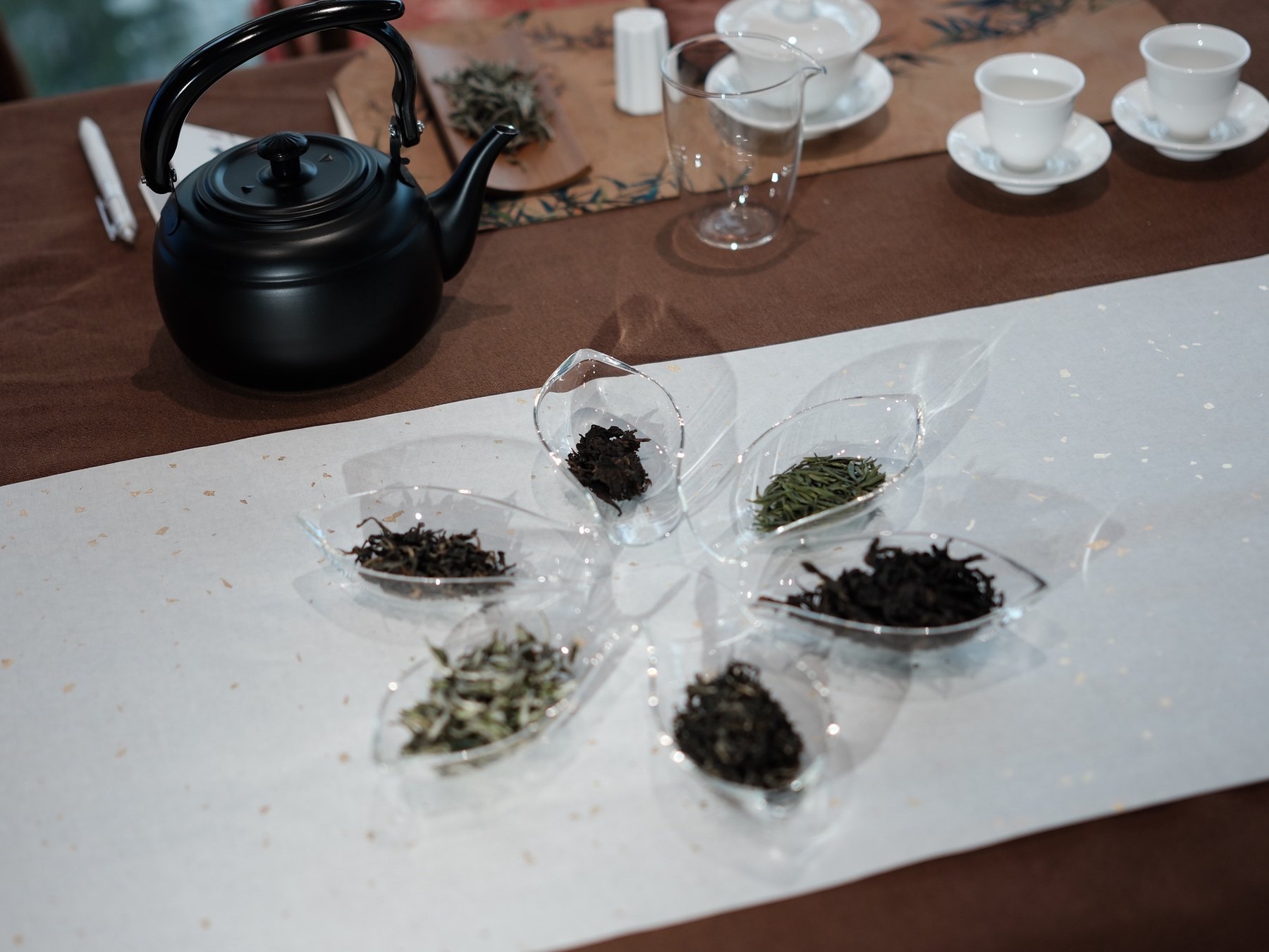 Different Chinese tea leaves prepared for sensory comparison