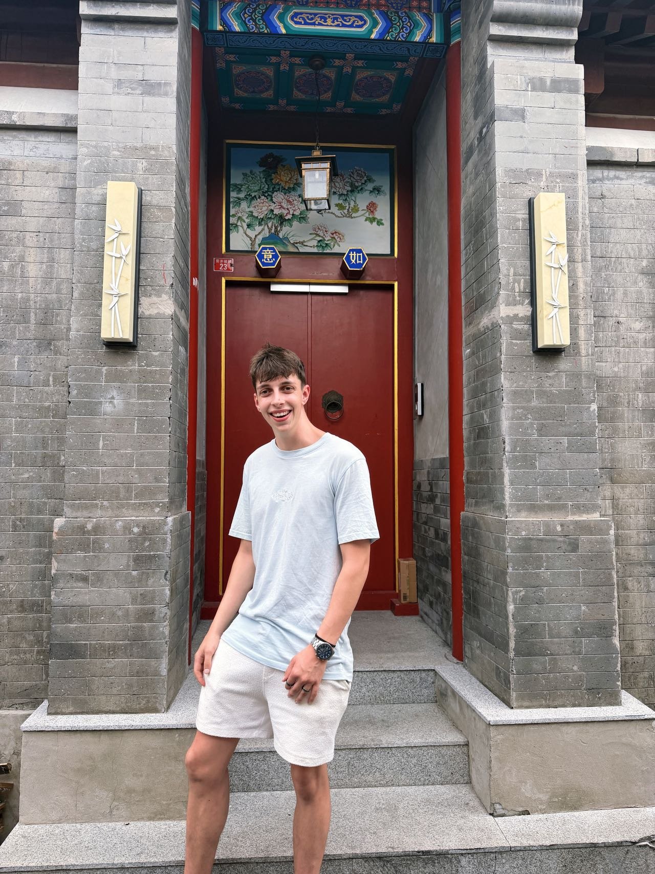 International guest visiting a traditional hutong courtyard during a private China journey