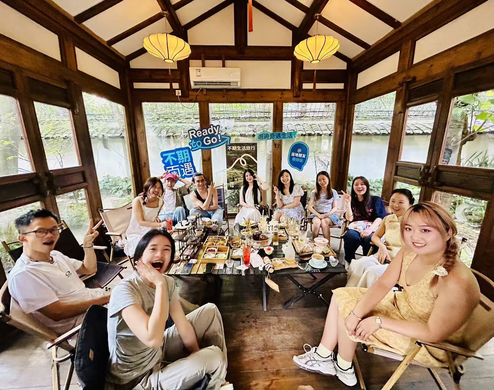 The team behind Inside China during a travel community gathering in a tea house